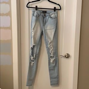 Light wash distressed high rise jeans